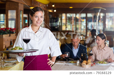 Portrait of waitress ready to serving meals Portrait of waitress ready to serving meals 79168129