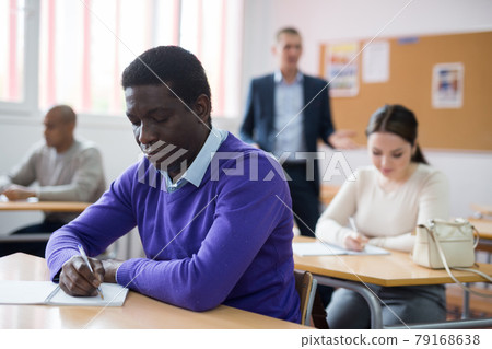 African-american student among students in classroom African-american student among students in classroom 79168638