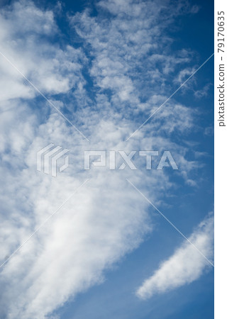 View of cirrus clouds on blue sky background View of cirrus clouds on blue sky background 79170635