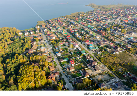 Aerial view of houses on lake bank. Tyumen. Russia 79170996