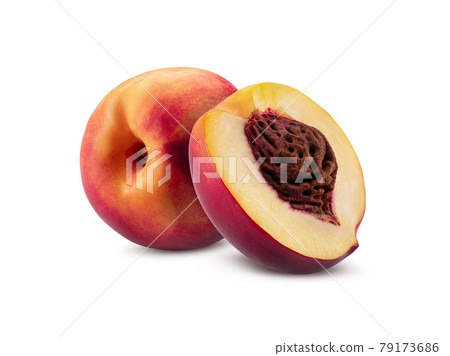 Smooth-skinned whole nectarine and one half with kernel isolated on white background with copy space for text or images. Close-up shot. Smooth-skinned whole nectarine and one half with kernel isolated on white background with copy space for text or images. Close-up shot. 79173686