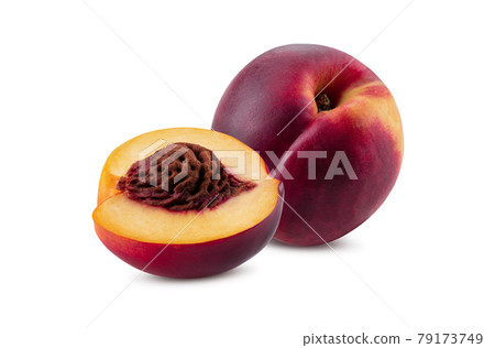 Smooth-skinned whole nectarine and one half with kernel isolated on white background with copy space for text or images. Close-up shot. Smooth-skinned whole nectarine and one half with kernel isolated on white background with copy space for text or images. Close-up shot. 79173749