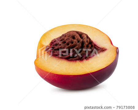 Smooth-skinned nectarine fruit with kernel isolated on white background with copy space for text or images. Side view. Close-up shot. Smooth-skinned nectarine fruit with kernel isolated on white background with copy space for text or images. Side view. Close-up shot. 79173808