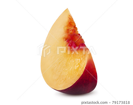 Unpitted, smooth-skinned nectarine fruit slice isolated on white background with copy space for text or images. Close-up shot. Unpitted, smooth-skinned nectarine fruit slice isolated on white background with copy space for text or images. Close-up shot. 79173818