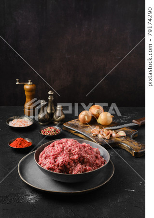 Ground beef forcemeat in a bowl 79174290