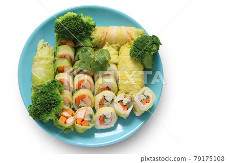 Vegetable Roll, Minced Pork, Crab Stick, Chicken with Broccoli in Blue Plate isolated on white background with clipping path. Salad rolls. Top view of healthy food. Vegetable Roll, Minced Pork, Crab Stick, Chicken with Broccoli in Blue Plate isolated on white background with clipping path. Salad rolls. Top view of healthy food. 79175108