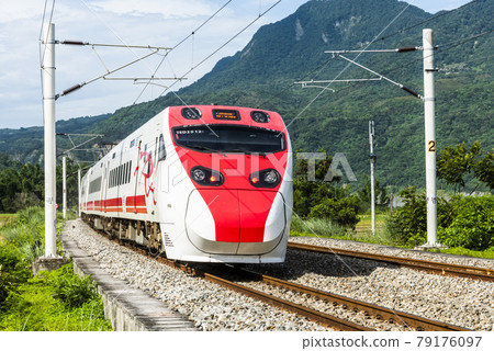 Tze-Chiang Limited Express(Puyuma) train through the beautiful countryside of Hualien, Taiwan 79176097