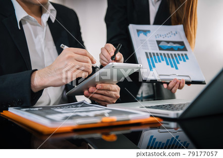 Business team meeting present. professional investor working with new startup project. Finance managers task.Digital tablet and laptop computer design tablet in morning light. Business team meeting present. professional investor working with new startup project. Finance managers task.Digital tablet and laptop computer design tablet in morning light. 79177057