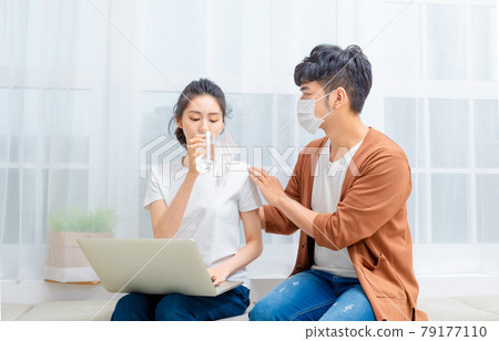Man taking care of sick family member Man taking care of sick family member 79177110
