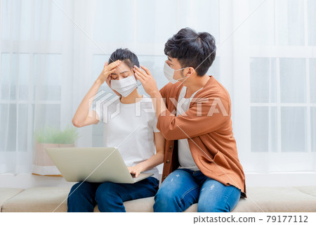 Man taking care of sick family member Man taking care of sick family member 79177112