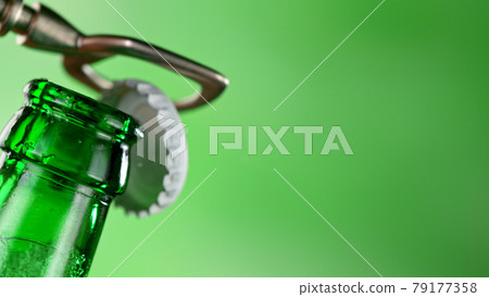 Freeze motion of opening beer bottle. Freeze motion of opening beer bottle. 79177358