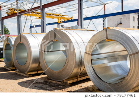 Stainless steel rolls. Rolls of steel sheet in the warehouse. A roll of galvanized steel sheet for 79177461