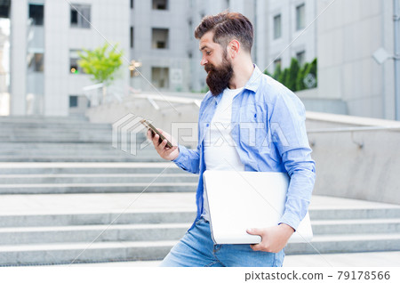 Got SMS. Bearded man read SMS in mobile phone. Got SMS. Bearded man read SMS in mobile phone. 79178566