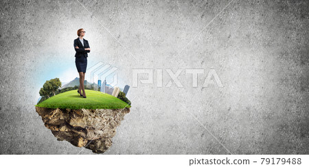 Confident lady boss and modern city as concept of eco green construction Confident lady boss and modern city as concept of eco green construction 79179488