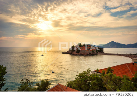 Sunset over Sveti Stefan islet in Montenegro 79180202
