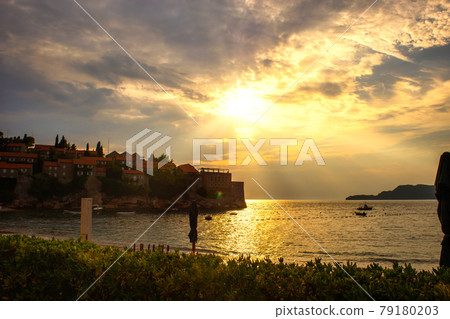 Sunset over Sveti Stefan islet in Montenegro 79180203