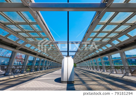 Teleport Bridge is a pedestrian bridge that connects the Daiba and Aomi districts in Odaiba, Tokyo. Teleport Bridge is a pedestrian bridge that connects the Daiba and Aomi districts in Odaiba, Tokyo. 79181294