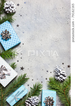 Christmas composition on gray stone table Christmas composition on gray stone table 79182165