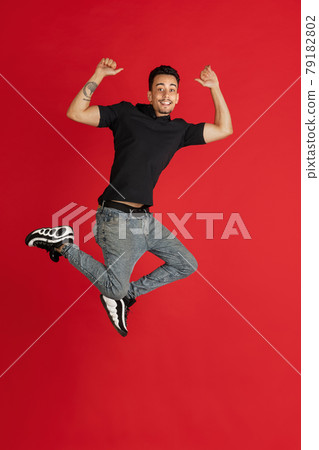 I won. Winning success happy man celebrating being a winner. Dynamic image of Caucasian male model on studio background. 79182802