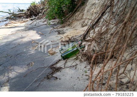 Ecology of Ukraine. Garbage on banks dnieper river or Kiev sea. Environmental pollution. Illegal garbage dump. World environmental pollution problem and issue with garbage. Environmental disaster 79183225