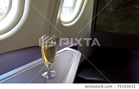 Welcome drink on Business class cabin, Welcome drink serve when passenger boarding. Welcome drink on Business class cabin, Welcome drink serve when passenger boarding. 79183632