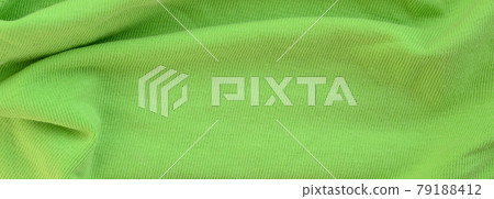 The texture of the fabric is bright green. Material for making shirts and blouses The texture of the fabric is bright green. Material for making shirts and blouses 79188412