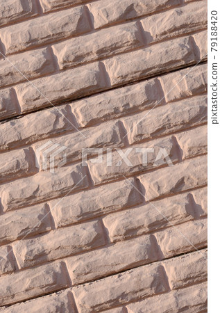 Texture of a relief concrete wall of beige color Texture of a relief concrete wall of beige color 79188420