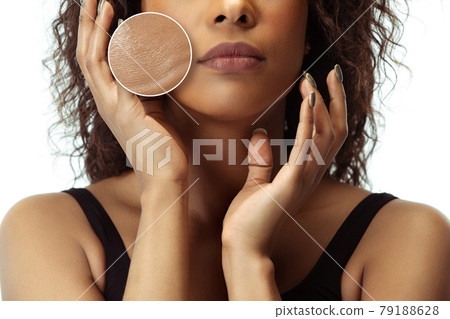 Beautiful female face isolated on white background. Concept of well kept skin, cosmetics. Beautiful female face isolated on white background. Concept of well kept skin, cosmetics. 79188628