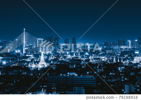 Aerial view of Rama 8 Bridge and Temple of Dawn or Wat Arun in Rattanakosin Island in architecture, Urban old town city, Bangkok skyline. downtown area, Thailand at night. 79188918