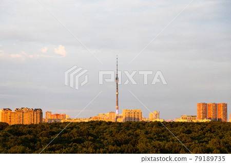 city park and high-rise houses on horizon at suset city park and high-rise houses on horizon at suset 79189735