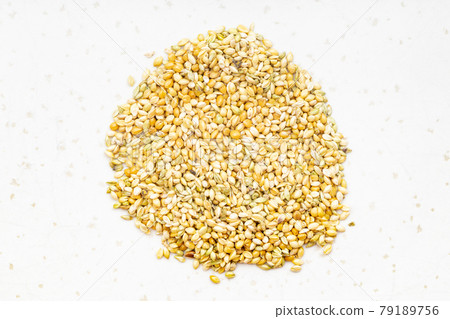 pile of whole-grain foxtail millet seeds on gray pile of whole-grain foxtail millet seeds on gray 79189756