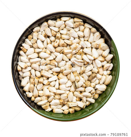 safflower seeds in round bowl isolated safflower seeds in round bowl isolated 79189761