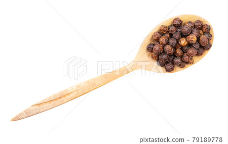 top view of red kampot pepper in wood spoon 79189778