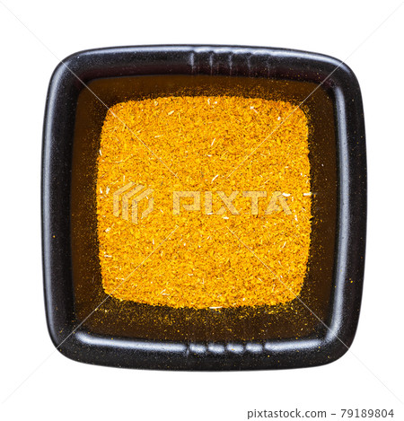 ground dried tagetes in black bowl isolated ground dried tagetes in black bowl isolated 79189804