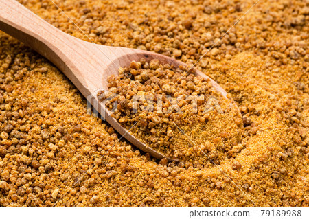 wooden spoon with granulated coconut blossom sugar wooden spoon with granulated coconut blossom sugar 79189988