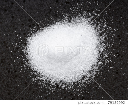 pile of crystalline erythritol sugar on black pile of crystalline erythritol sugar on black 79189992