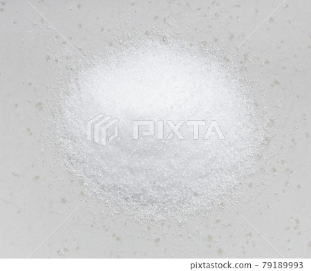 pile of crystalline erythritol sugar on gray pile of crystalline erythritol sugar on gray 79189993