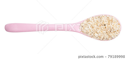 view of psyllium husk in ceramic spoon isolated view of psyllium husk in ceramic spoon isolated 79189998