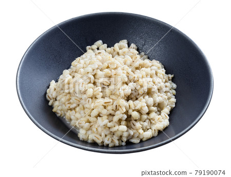 cooked porridge from pearled barley in gray bowl 79190074