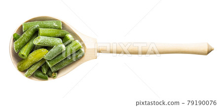 top view of frozen green beans in spoon isolated 79190076
