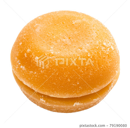 pair of whole round pieces of palm sugar isolated 79190080