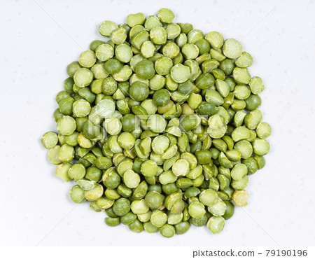 pile of dried green split peas close up on gray pile of dried green split peas close up on gray 79190196