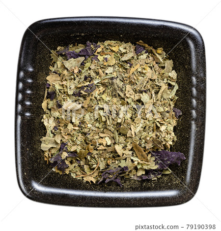 purple and green basil herb in black bowl isolated purple and green basil herb in black bowl isolated 79190398