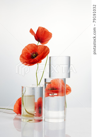 Product crystal minimal scene with glass geometric display platform and poppies flowers. Stand to show cosmetic product. 79191032