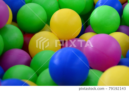 Swimming pool for fun and jumping in colored plastic balls Swimming pool for fun and jumping in colored plastic balls 79192143