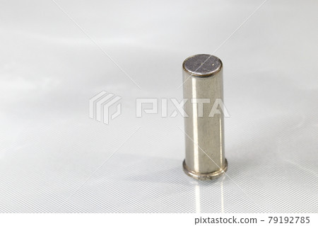 close up The .38 Special wadcutter bullet specifically designed for shooting paper targets isolated on reflection surface. close up The .38 Special wadcutter bullet specifically designed for shooting paper targets isolated on reflection surface. 79192785