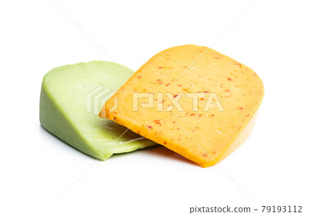 Block of hard cheese with chili and wasabi flavor. Block of hard cheese with chili and wasabi flavor. 79193112