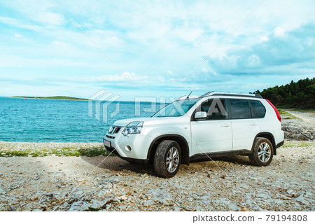 car travel concept suv at seaside 79194808