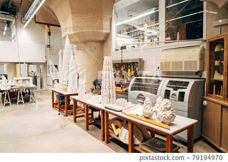 Barcelona, Spain - 15 December 2019: Architect's workshop in Sagrada Familia. Desktops and papier-mache with images. Barcelona, Spain - 15 December 2019: Architect's workshop in Sagrada Familia. Desktops and papier-mache with images. 79194970