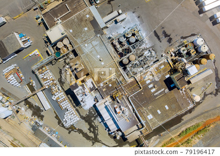Aerial panoramic view of tanks for chemical mixing Industrial plant with chemical industry system 79196417